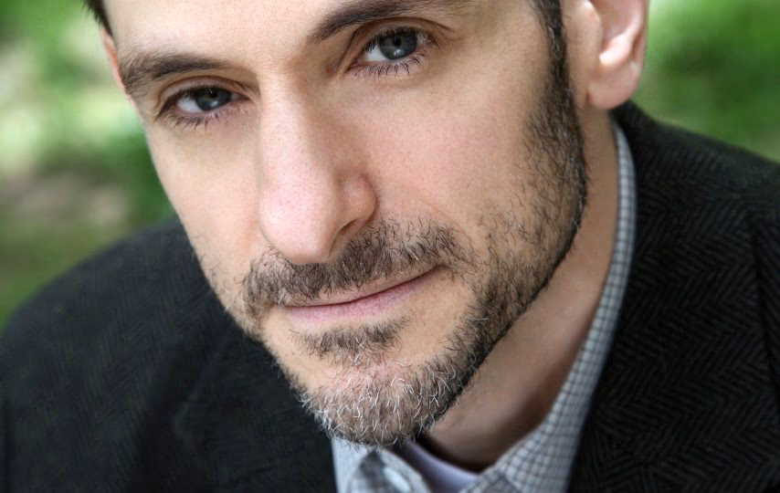 What is Amir Levine's education?