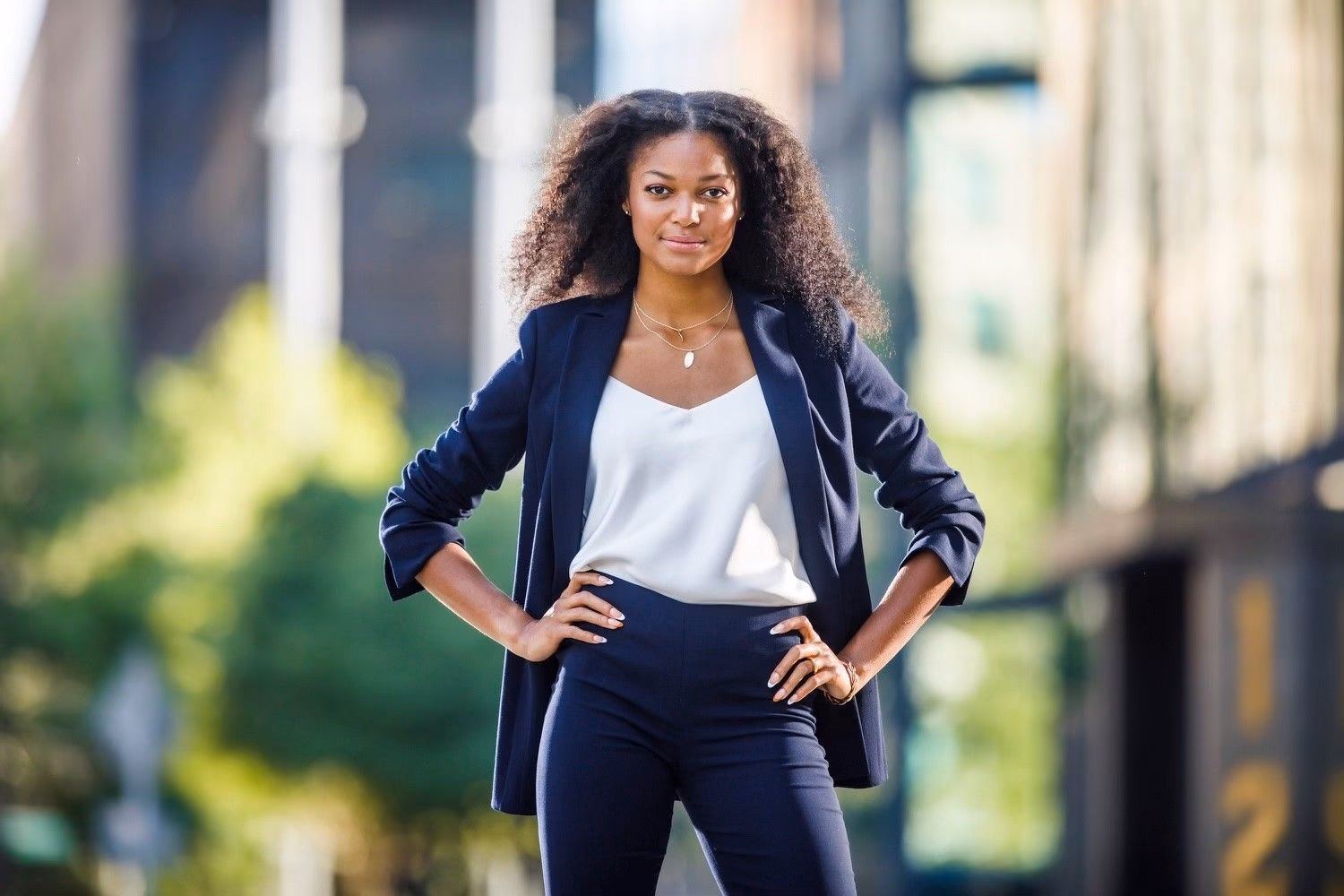 What degree did Gabby Thomas get at Harvard?